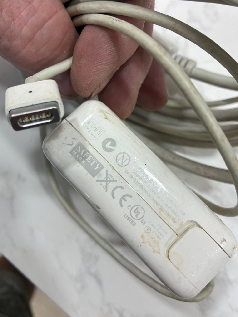 ADP-60AD D is a Apple 60w power adapter